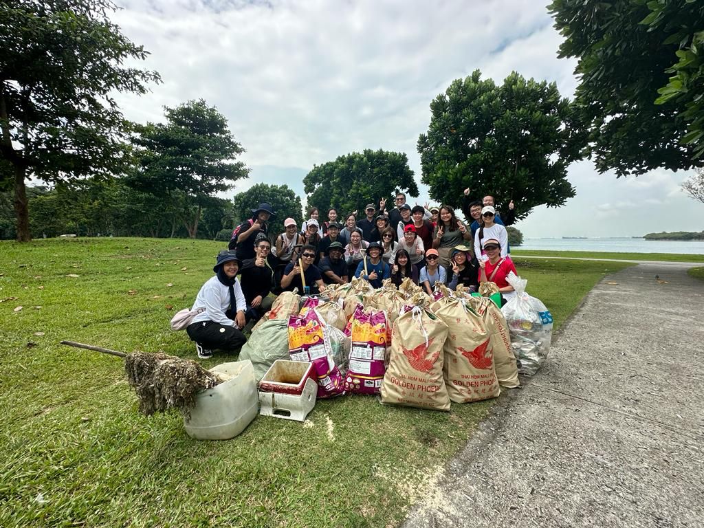 SLA staff with the rubbish collected from a coastal clean-up on Lazarus Island.